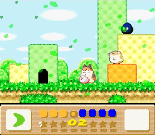 Screenshot from Kirby's Dreamland 3 for Super Nintendo. In a grassy outdoor area, a large cat rolls Kirby like a ball, while nearby a big chubby hamster looks sad and a blue slime ball stands around with its eyes all googly.